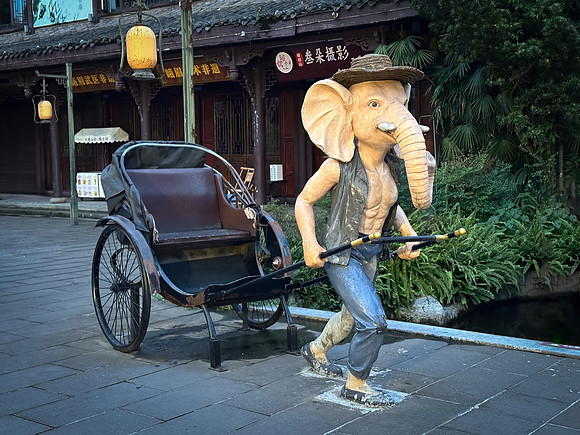 Rickshaw Statue, Central Emeishan